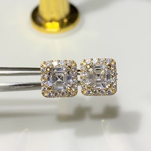 14K massief geelgouden witte saffieroorknopjes.