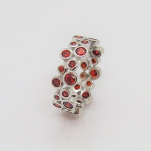 Sterling Silver Round cut Garnet Eternity Band Ring.