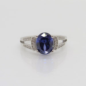 Sterling Silver Tanzanite & White Topaz Solitaire Ring.