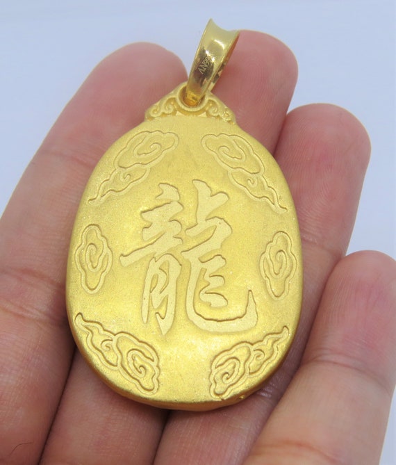 ドラゴン彫刻の金色メダル