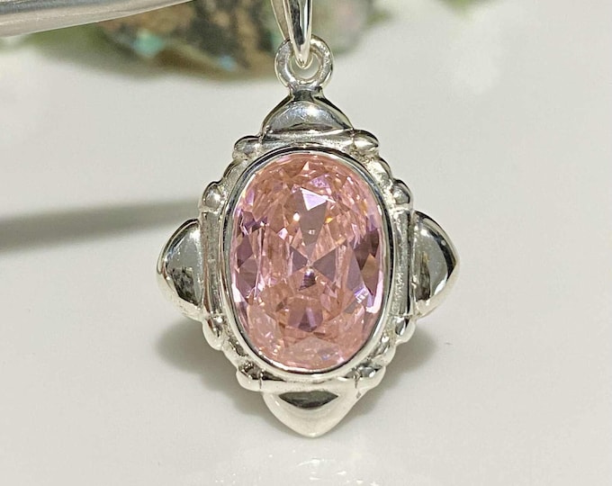 Vintage Sterling Silver Oval cut Pink Sapphire Pendant.