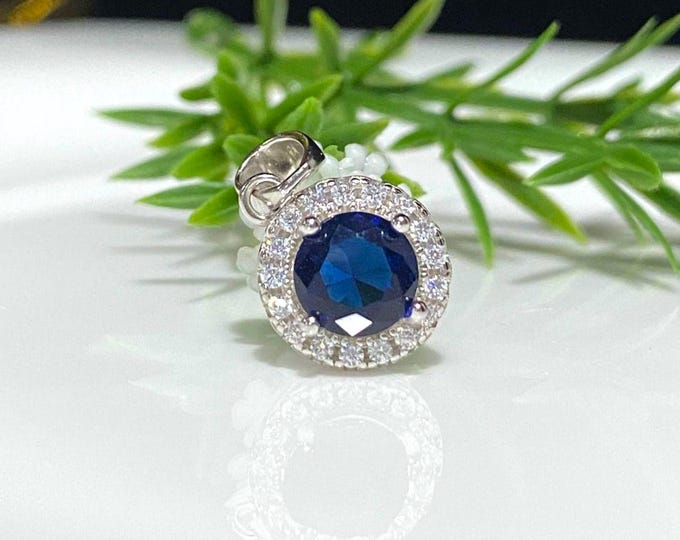 Vintage Sterling Silver Blue Sapphire & White Topaz Halo Pendant.