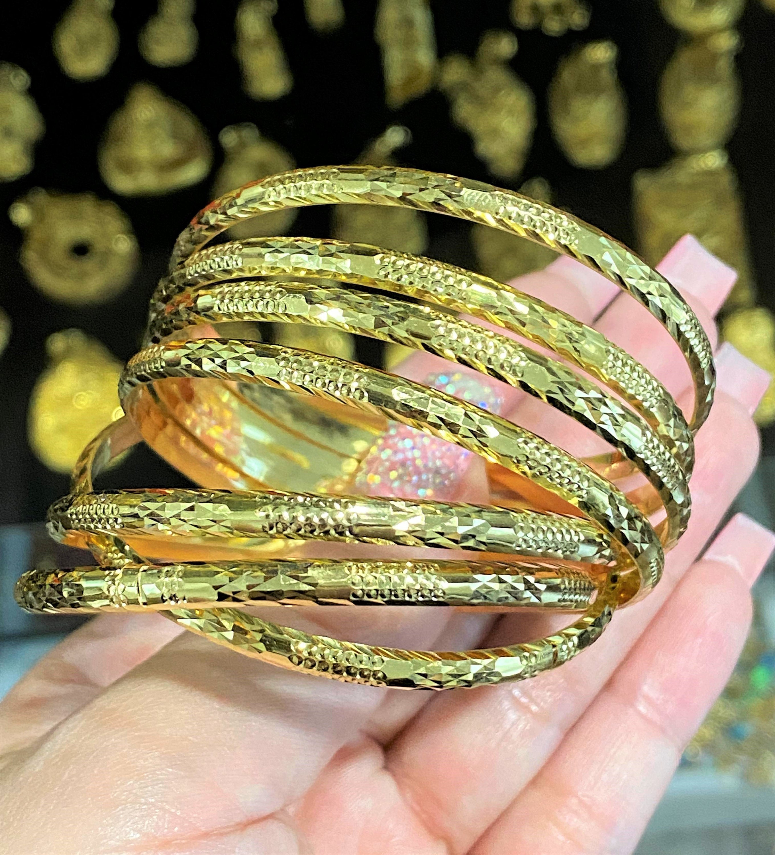 18K Yellow Gold 7 Pieces Set Bangle Diamond Cut. 52.5mm 18K Yellow Gold 7 Pieces Set Bangle Diamond Cut. 52.5mm