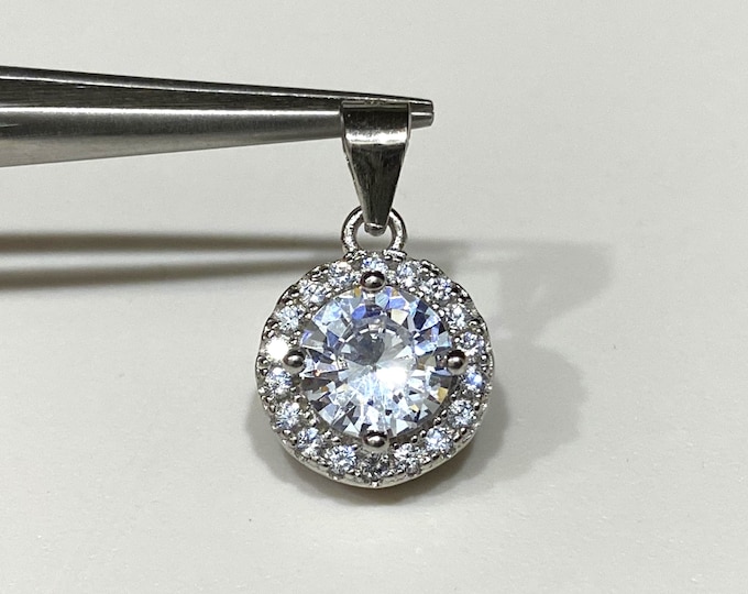 Sterling Silver White Topaz Halo Pendant.