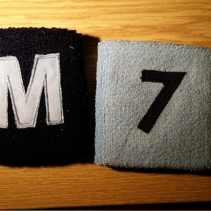 1 wristle bound embroiderd number