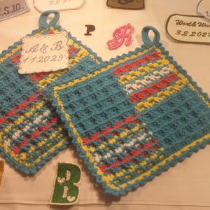 Pegadores de panela bordados à mão