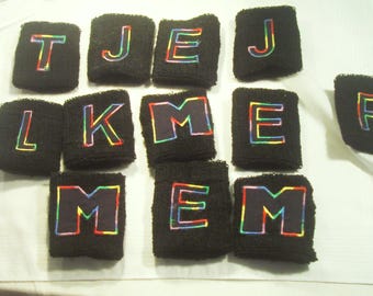 wristle bound embroiderd letter,name