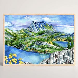 May include: Watercolor painting of a mountain range with a lake in the foreground. The mountains are a light blue and green color, and the lake is a deep blue. There are yellow wildflowers in the foreground.