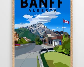 May include: A colorful illustration of a mountain town with a blue sky, white clouds, and a Canadian flag. The text "BANFF ALBERTA" is at the top of the image.
