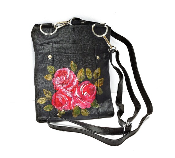 small black purse with long strap