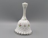 Fenton silver crested bell signed by artist