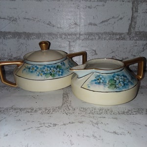 Limoges beautiful blue flowered cream and sugar