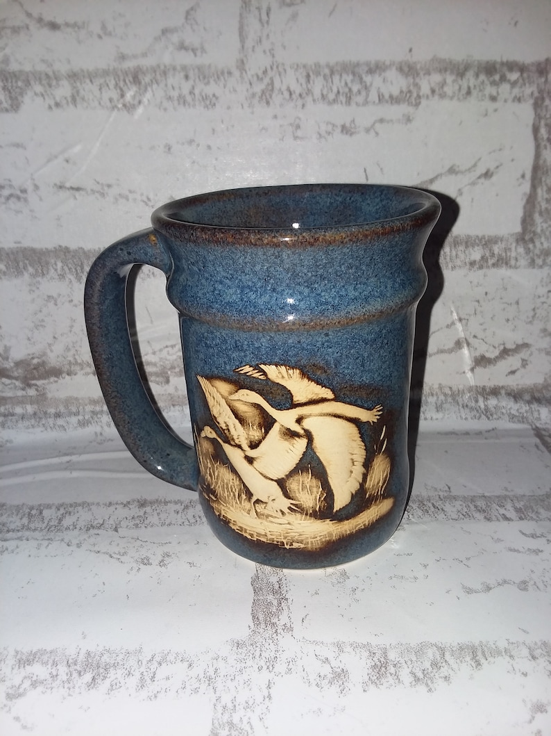 Ceramic blue mug with geese
