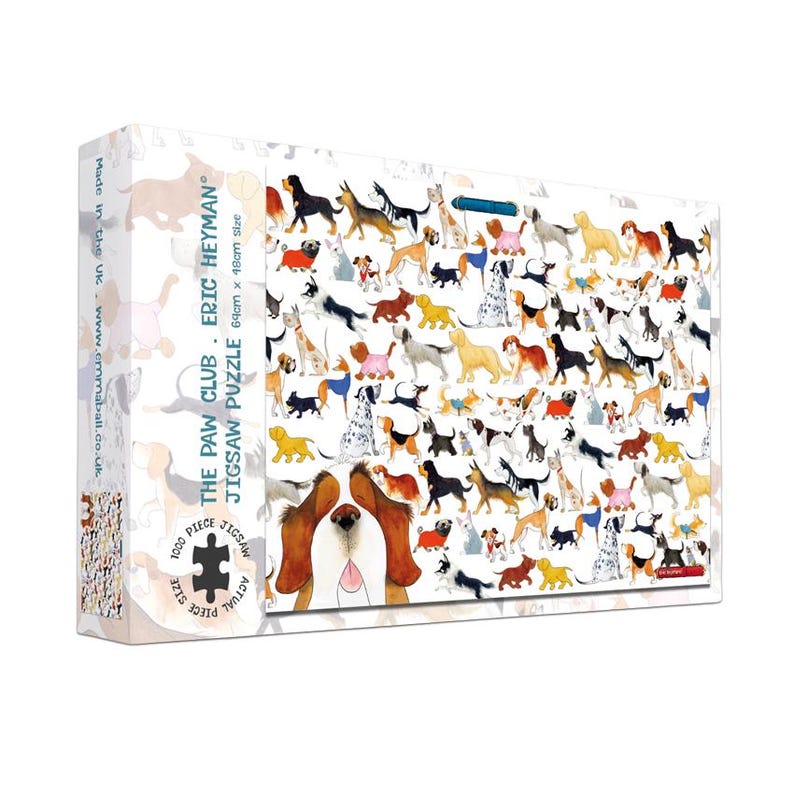 May include: A jigsaw puzzle box featuring a colorful illustration of various dog breeds. The box reads "THE PAW CLUB ERIC HEYMAN" and "1000 PIECE JIGSAW" with an actual size of 27 inches x 19 inches. The puzzle is made in the UK.