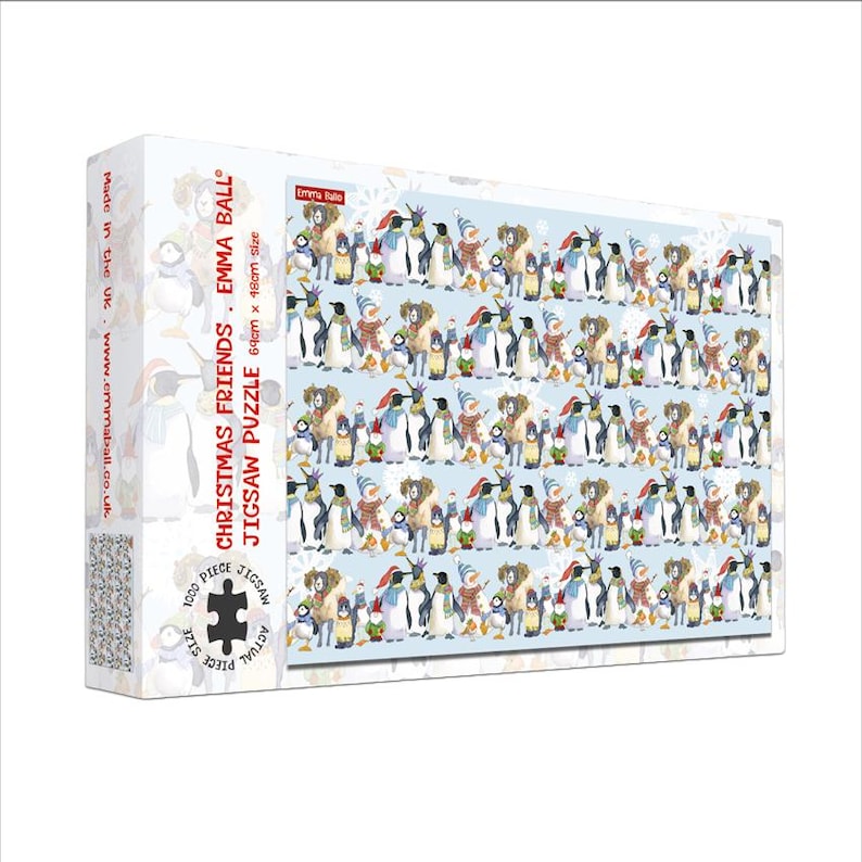 May include: A boxed 1000-piece jigsaw puzzle titled "Christmas Friends" by Emma Ball. The puzzle features a repeating pattern of penguins wearing winter clothing. The box is white with text and a penguin illustration. The puzzle size is 69cm x 18cm.