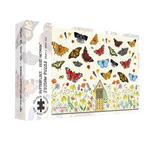 May include: A jigsaw puzzle box featuring a colorful butterfly design. The box reads "BUTTERFLIES. ERIC HEYMAN JIGSAW PUZZLE" and "1000 PIECE SIZE". The puzzle size is 69cm x 48cm.