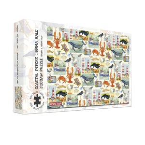 May include: A boxed 1000-piece jigsaw puzzle titled "Coastal Pieces" by Emma Ball. The puzzle features a collage of coastal imagery, including lobsters, whales, seagulls, lighthouses, and boats. The box is labeled with the size: 64cm x 48cm.