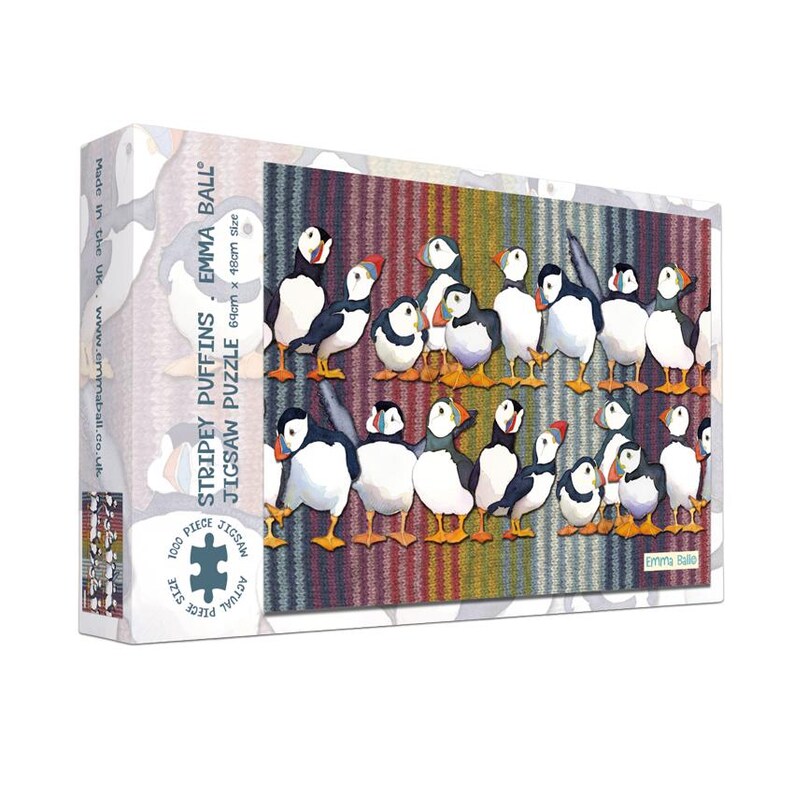 May include: A jigsaw puzzle box featuring a colorful illustration of puffins. The puzzle is titled "Stripey Puffins" and contains 1000 pieces. The box dimensions are 64cm x 48cm.