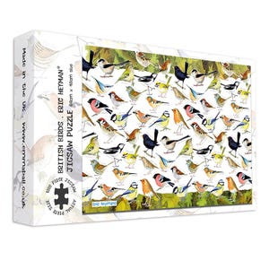 May include: A jigsaw puzzle box featuring a colorful illustration of various British birds. The puzzle is labeled "British Birds" and includes the text "1000 Piece Jigsaw Puzzle." The box dimensions are 27 inches x 19 inches.