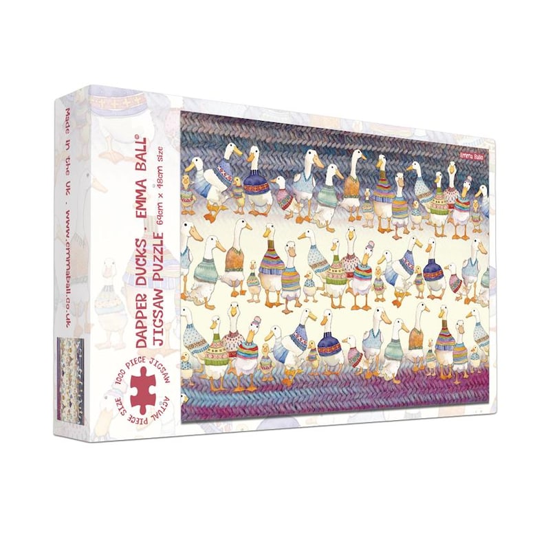 May include: A boxed 1000-piece jigsaw puzzle featuring a whimsical illustration of numerous ducks dressed in colorful sweaters and vests. The puzzle is titled "Dapper Ducks" and measures 27 inches by 19 inches.