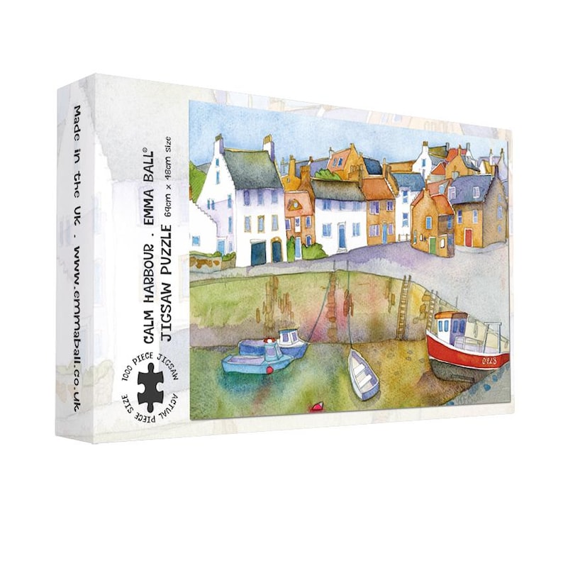 May include: A jigsaw puzzle box featuring a watercolor painting of a harbor scene with boats and buildings. The box reads "CALM HARBOUR" and "EMMA BALL JIGSAW PUZZLE" with a size of 64cm x 48cm. The puzzle has 1000 pieces.