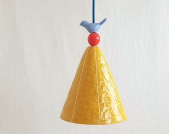 Pendant light. Ceramic cone with bird & bead detail. Hardwire or plugin cord