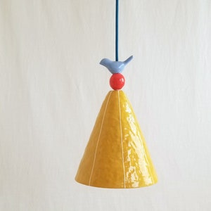 Pendant light. Ceramic cone with bird & bead detail. Hardwire or plugin cord