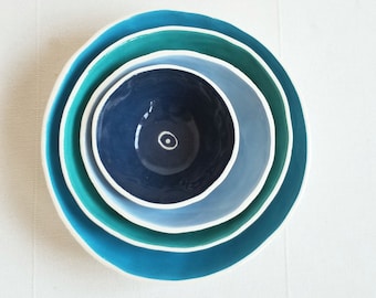 Blue nesting bowls. Set of 4 small ceramic dishes