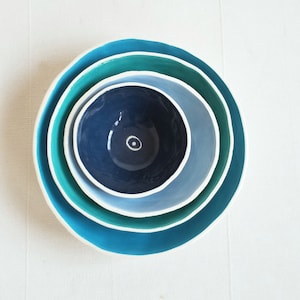 set of 4 nesting bowls in different shades of blue