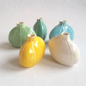 Striped bud vase in bright, Danish pastel colors