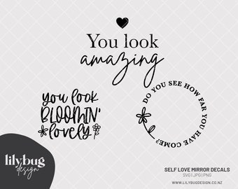 May include: Black and white mirror decals with the text "You look amazing" and "You look bloomin' lovely" with a flower design. The decals also include a circle with the text "Do you see how far you have come?"