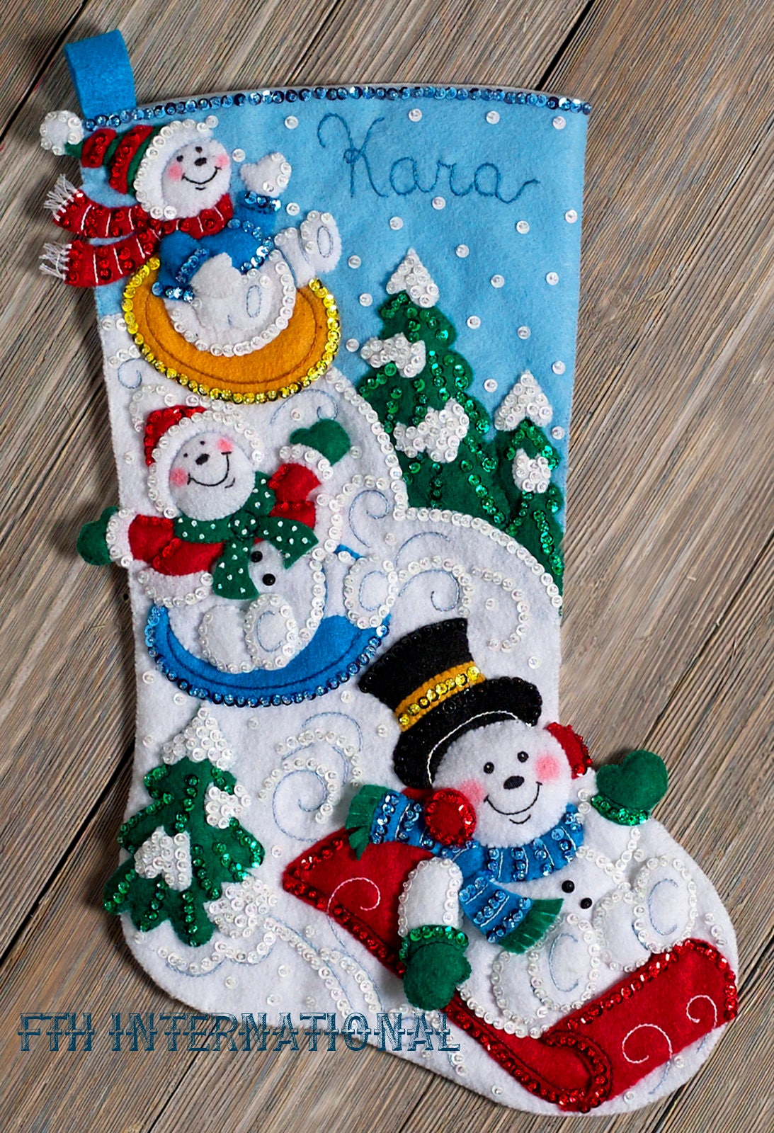 85174 Bucilla Felt Christmas Stocking KIT: Teddy with Ornaments Size:  45.7cm Made in USA Kit Includes: Stamped Felts, Cotton Floss, Metallic  Thread, Colour Separated Sequins and Beads, 2 needles, tri-lingual  Instructions, directions