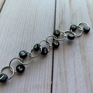 Row Counting Chain Stitch Marker (black beads/white numbers)