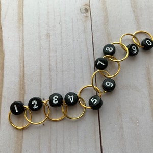 Row Counting Chain Stitch Marker (black beads/white numbers) gold rings