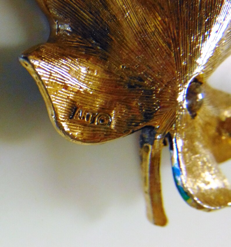 ART lady bug on leaf brooch