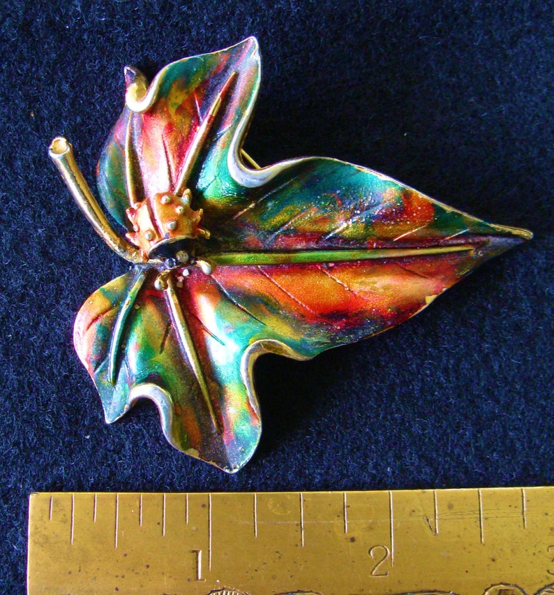 ART lady bug on leaf brooch