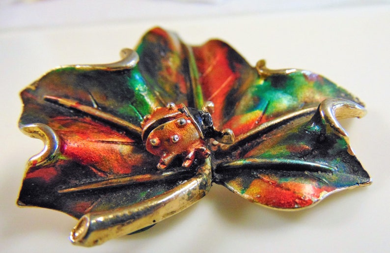 ART lady bug on leaf brooch