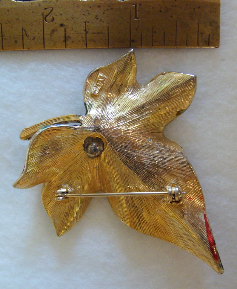 ART lady bug on leaf brooch