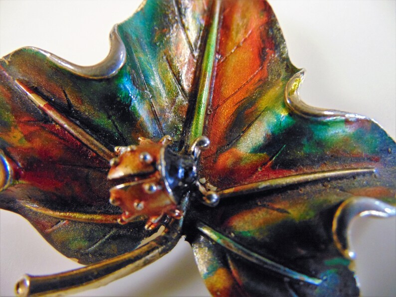 ART lady bug on leaf brooch