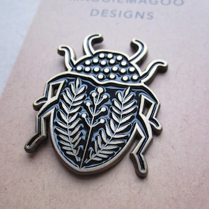 Beetle enamel pin brooch, scarab beetle design, black and gold metal