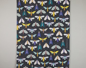 Tea towel, dark moths pattern