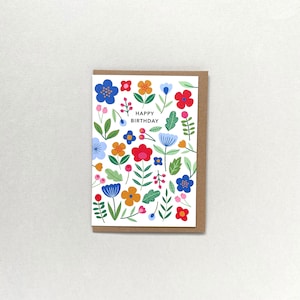 Cartão floral gráfico de feliz aniversário
