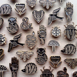 Hand enamel pin, tattoo folk design, black and gold metal brooch image 3