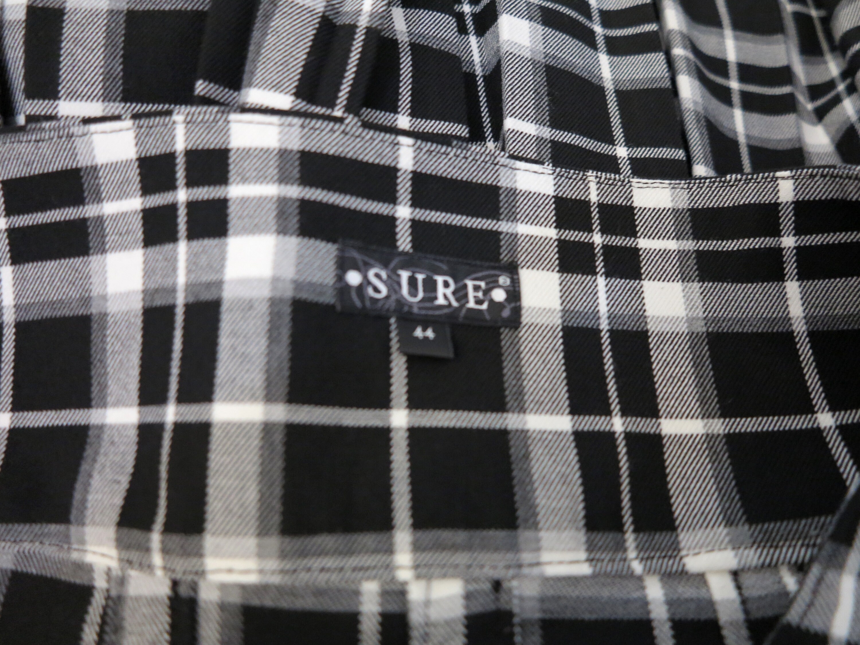 Black and white checkered skirt 8x8 hot sale