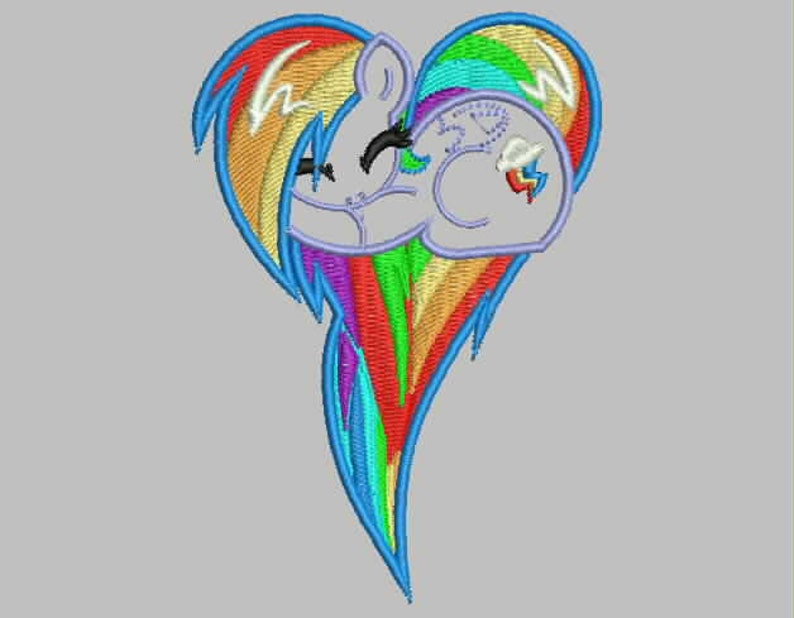 May include: A rainbow heart with a cartoon pony's face inside. The pony has a blue mane and tail, and a pink nose. The heart is made of a rainbow of colors, including red, orange, yellow, green, blue, indigo, and violet.
