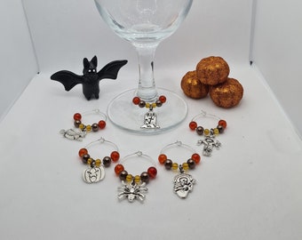 Halloween wine glass charm markers witch, scarecrow, spider. Orange brown yellow autumnal/fall beads