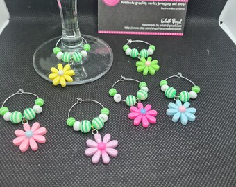 6 coloured daisy funky wine glass charms