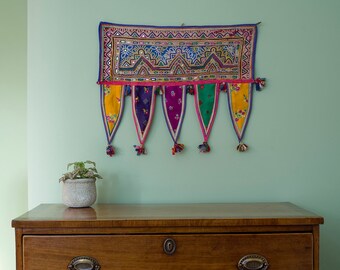 Pelmet Wall hanging - Embroidered wall hanging on Blue and Rust