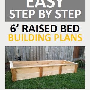 May include: A 6 foot long raised garden bed made of natural wood. The bed is sitting on a green lawn in front of a wooden fence. The text "EASY STEP BY STEP 6' RAISED BED BUILDING PLANS STEWART LANDING CO" is displayed on the image.