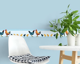 May include: A light blue wall with a decorative border featuring roosters and chicks. The border is above a white chair with a black and white checkered cushion. A white table and a vase with green leaves are also in the image.
